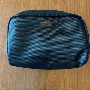 Tumi Black Mini Cosmetic Pouch.